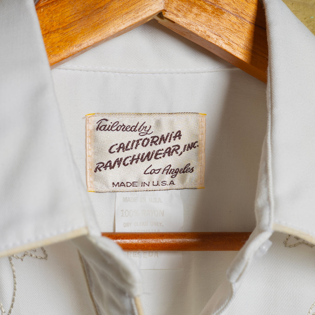 Vintage California Ranchwear Women's White Rayon Embroidered Cowboy Shirt with Pearl Snaps - Size Medium